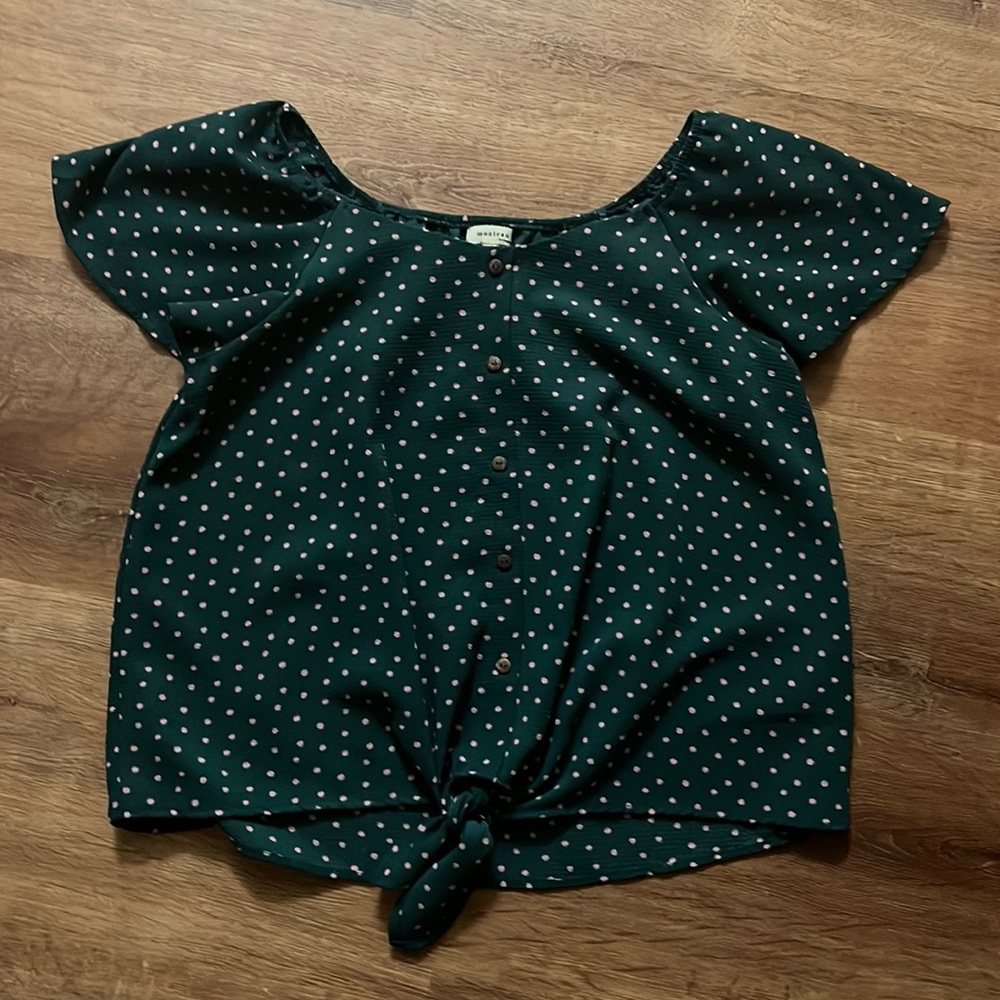 cute green top with pink polka dots and a bow detailing in front, button up